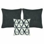 A pair of plain grey cushion cover and one patterned cushion cover in white and grey.