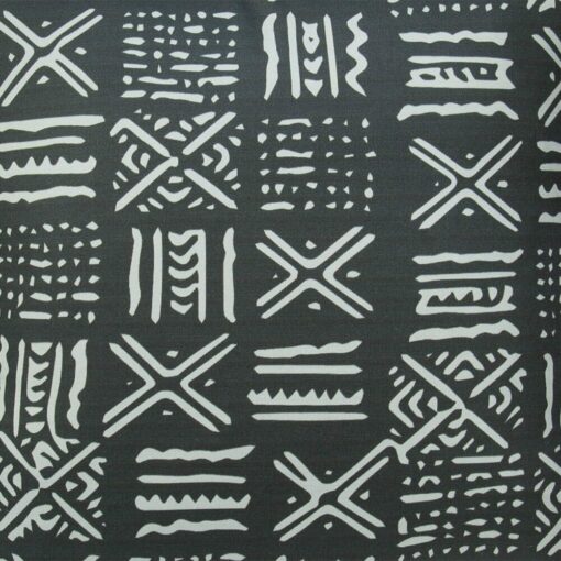 Close up image of black and white outdoor cushion cover with tribal geometric print