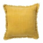 Image of mustard yellow cushion made of cotton fabric