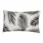 A lovely outdoor cushion with palm tree black and white print on a white background.