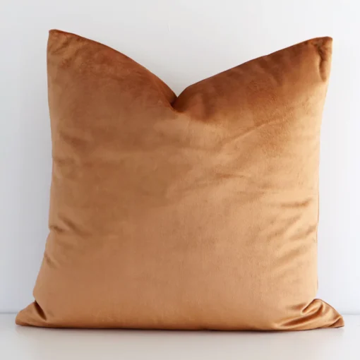 Lovely copper solid-coloured cushion made from velvet fabric and in an elegant square size.