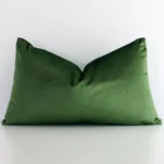 A premium rectangle forest green cushion boasting a solid green design and in a rectangle size.