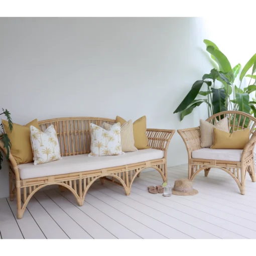 A lovely combination of 7 outdoor mustard lounge cushions in a cozy lounge.