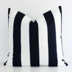 Striking large black and white cushion cover featuring a stripe style on quality outdoor fabric.