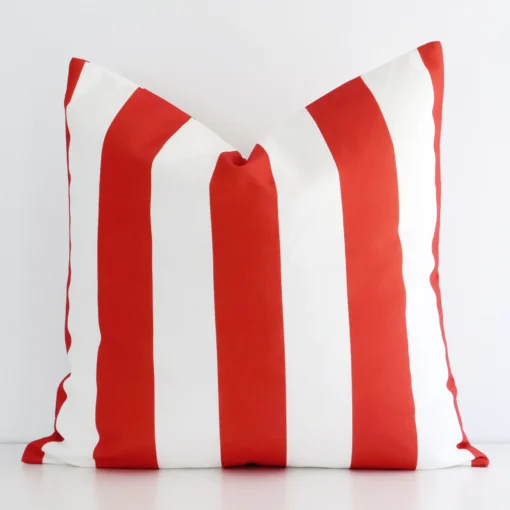 Gorgeous large outdoor cushion cover that has a red hue. It has a graceful stripe design.